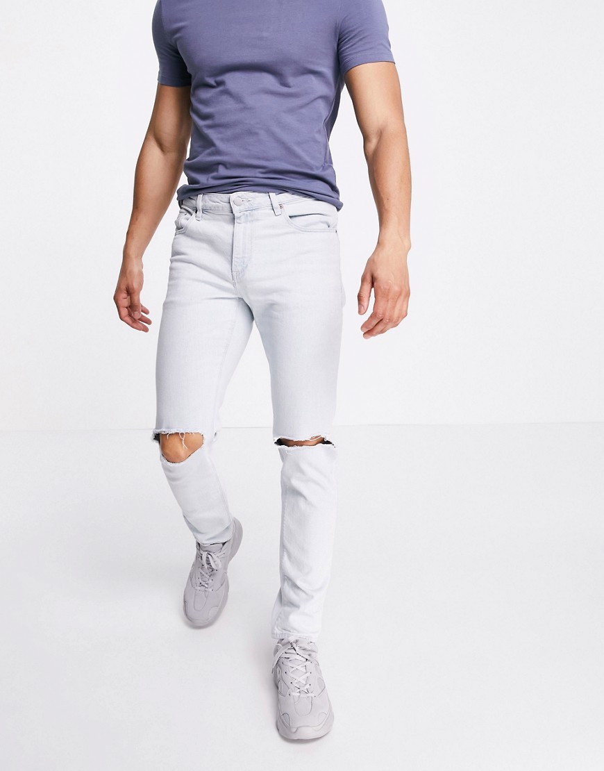 Asos Design Stretch Slim Jeans In Light Wash Blue With Knee Rips-blues
