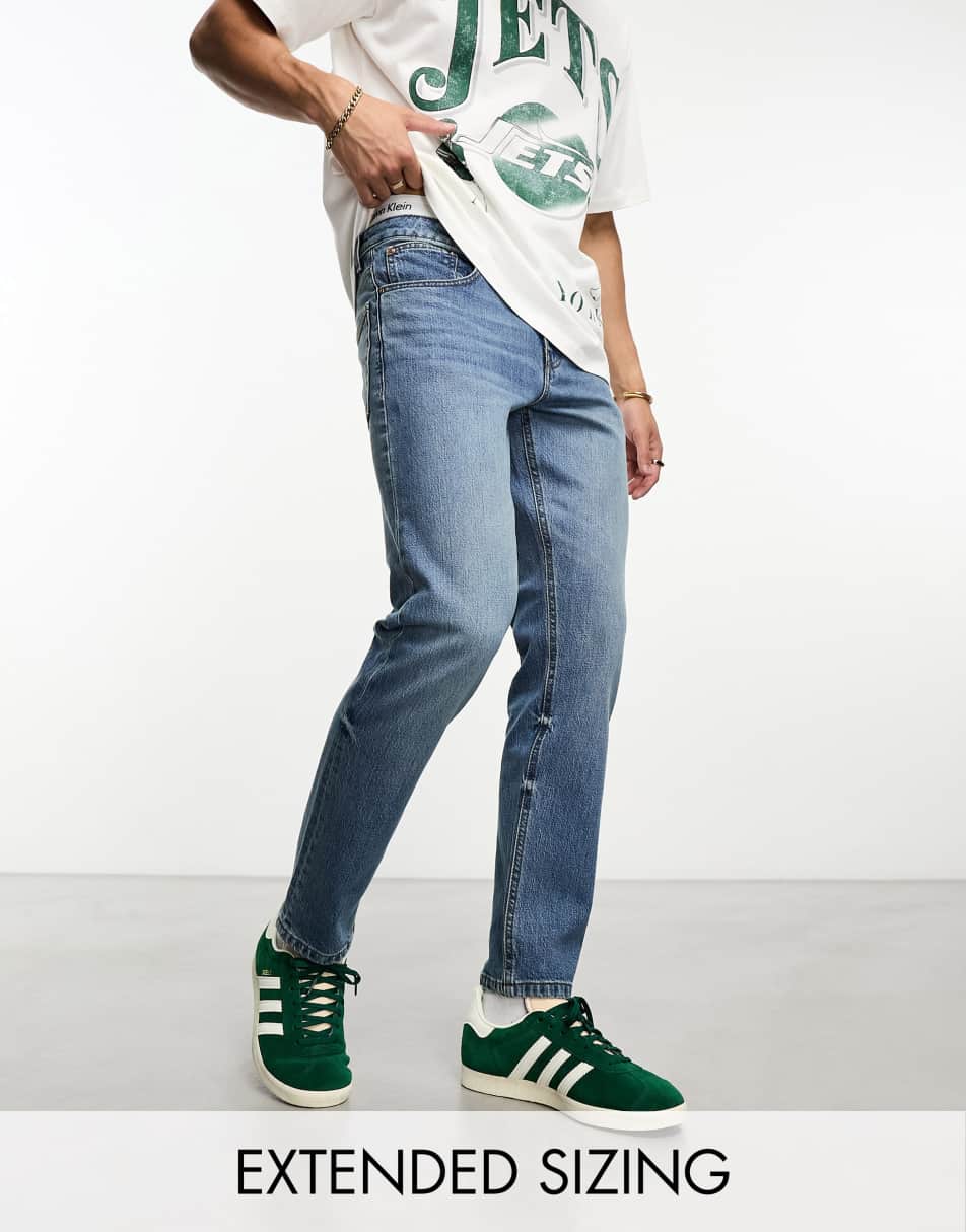 ASOS DESIGN stretch slim jeans in vintage blue tint