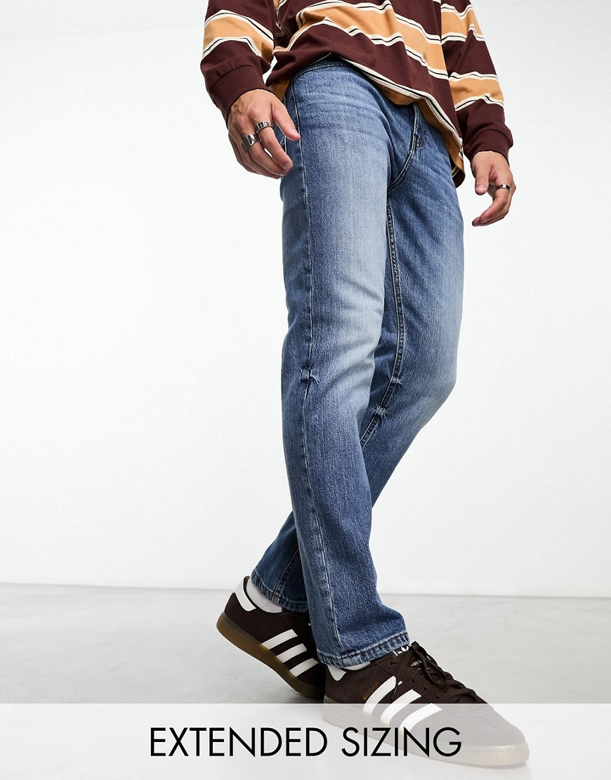 ASOS DESIGN stretch slim jeans in vintage mid blue