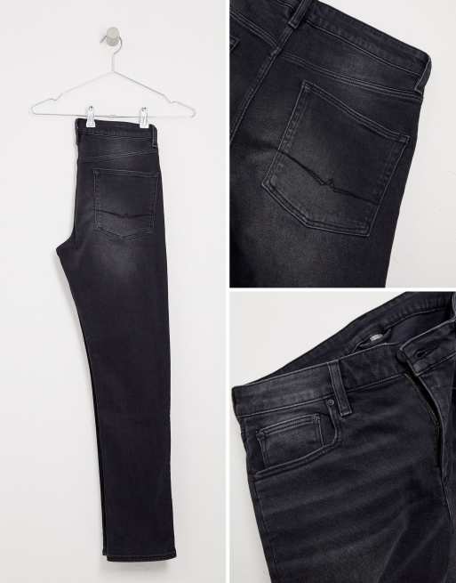 ASOS DESIGN stretch slim jeans in washed black, 4 of 4