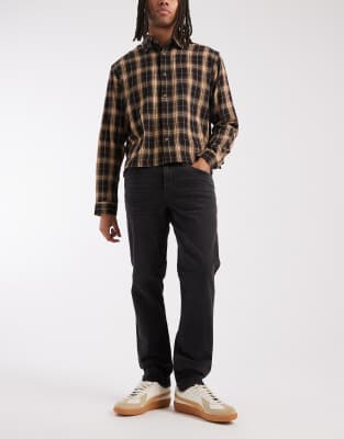 ASOS DESIGN stretch slim jeans in washed black