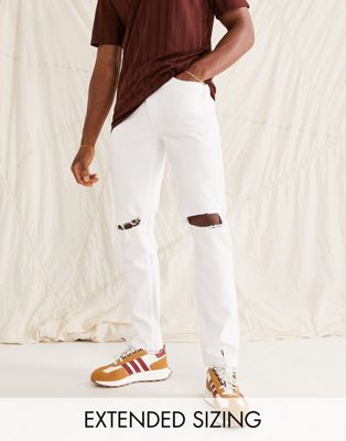 ASOS DESIGN stretch slim jeans in white with kneerips