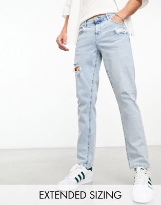 ASOS DESIGN stretch slim jeans with rips in light wash blue