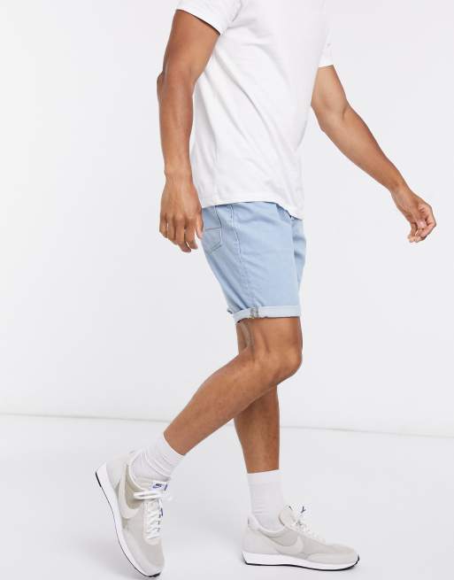 ASOS DESIGN stretch slim mid length denim shorts in light wash blue, 4 of 4