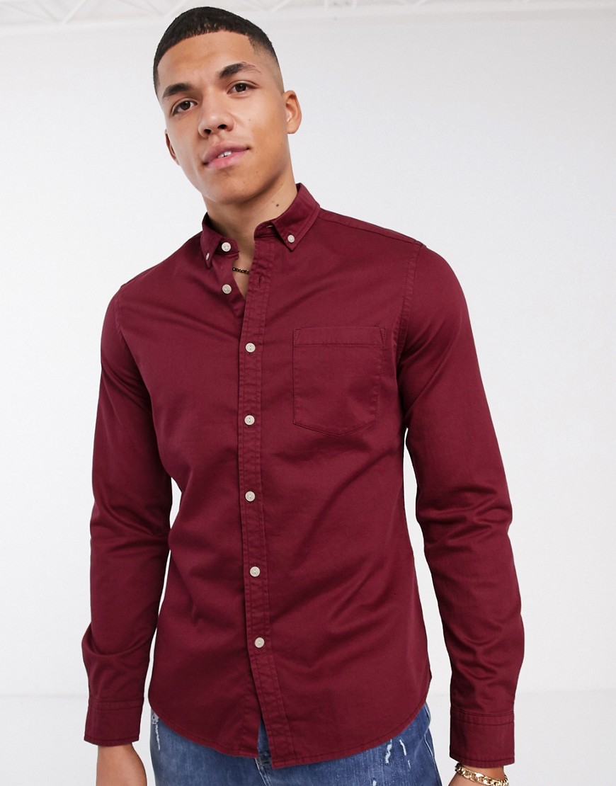 ASOS DESIGN stretch slim organic denim shirt in burgundy-Red