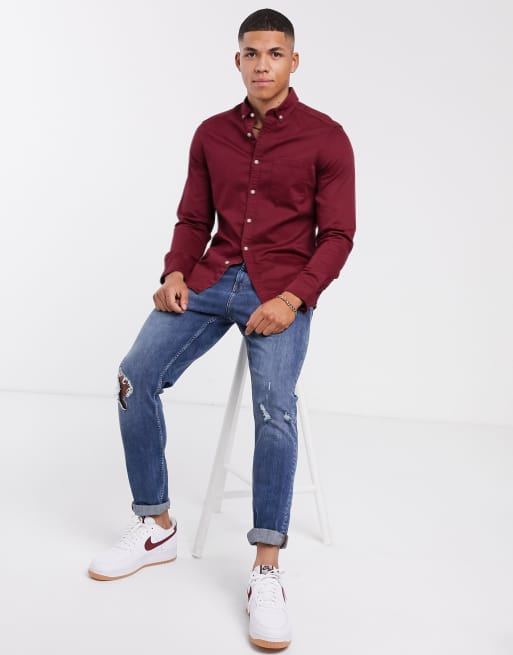 Maroon top blue store jeans