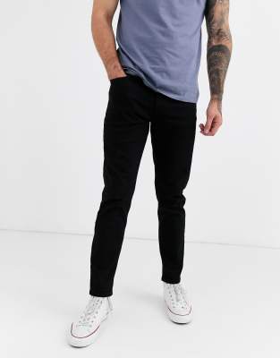 ASOS DESIGN stretch tapered jeans in 