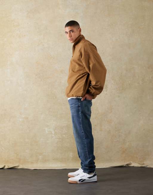 ASOS DESIGN stretch tapered jeans in dark wash blue, 2 of 6