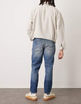 Asos Design Stretch Tapered Jeans In Blue