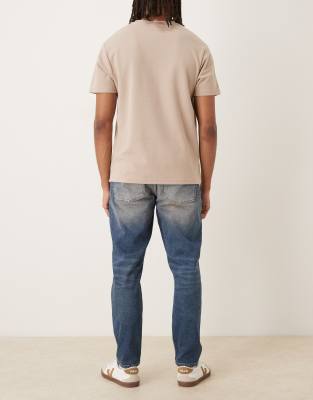Asos Design Stretch Tapered Jeans In Blue