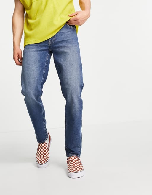 ASOS DESIGN stretch tapered jeans in dark wash