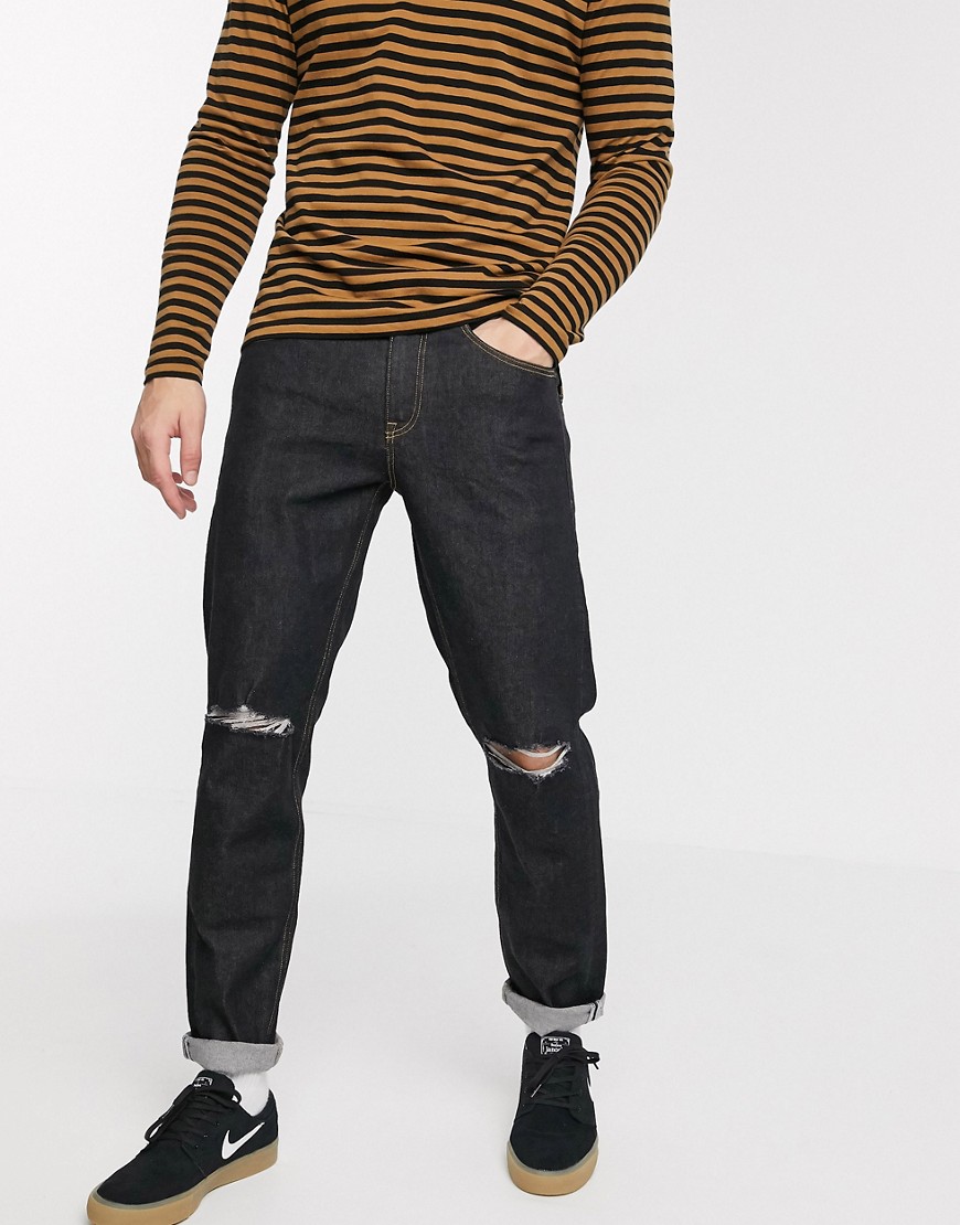 ASOS DESIGN stretch tapered jeans in flat black with knee rips
