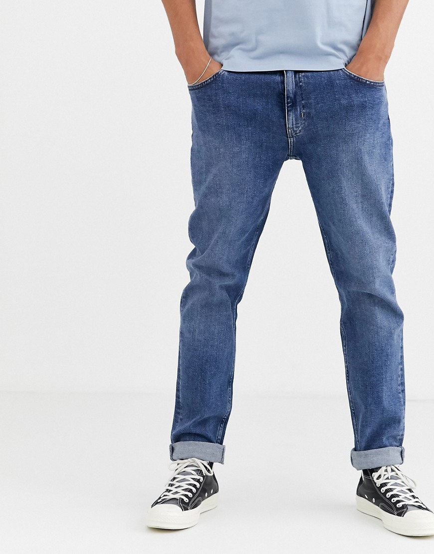 ASOS DESIGN STRETCH TAPERED JEANS IN FLAT MID WASH BLUE,TP FLAT MID BLUE WI