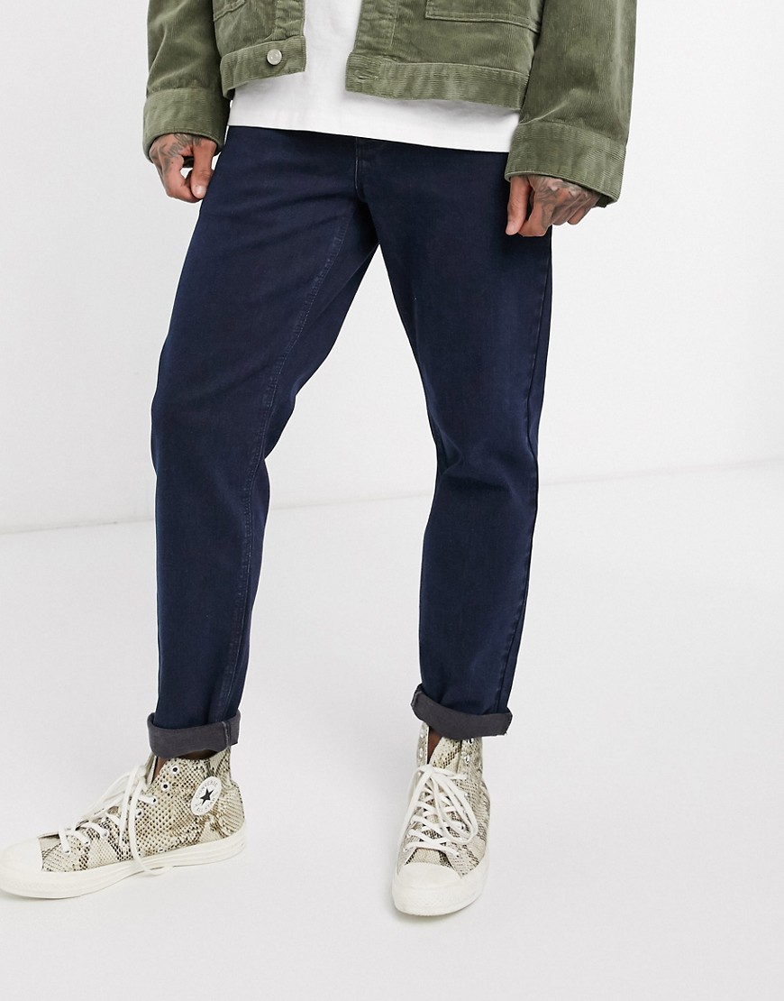 ASOS DESIGN stretch tapered jeans in indigo-Blues