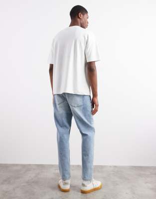 Asos Design Stretch Tapered Jeans In Blue