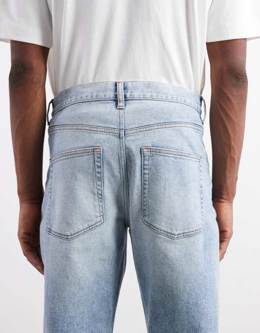 ASOS DESIGN stretch tapered jeans in light wash blue wash, 4 of 5