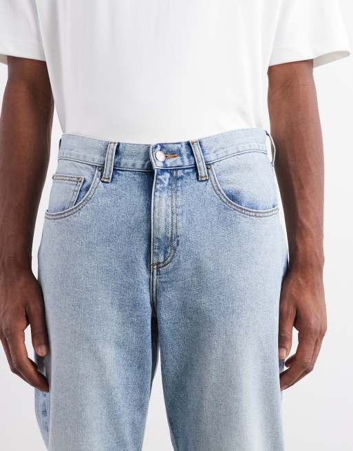 ASOS DESIGN stretch tapered jeans in light wash blue wash, 5 of 5