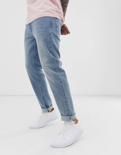 Light wash outlet tapered jeans