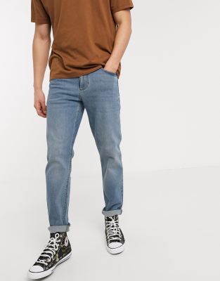 ASOS DESIGN stretch tapered jeans in 