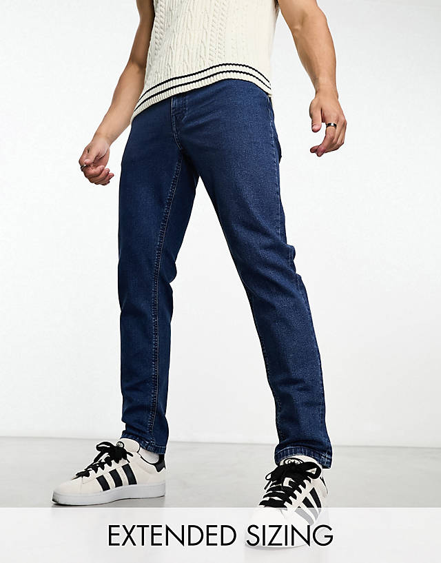ASOS DESIGN - stretch tapered jeans in retro mid wash blue