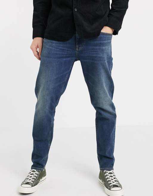 dark wash blue jeans