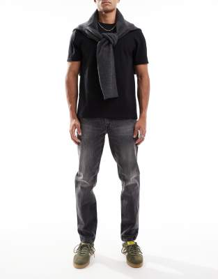 Asos Design Stretch Tapered Jeans In Washed Black