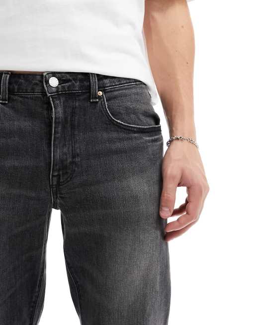 ASOS DESIGN stretch tapered jeans in washed black