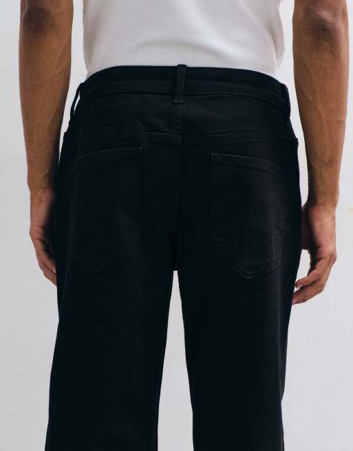 ASOS DESIGN stretchjeans med avsmalnande ben i svart, 4 av 5