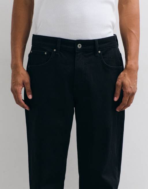 ASOS DESIGN stretchjeans med avsmalnande ben i svart, 5 av 5