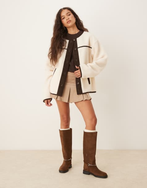 ASOS DESIGN – Strickjacke aus Teddyfell in Creme mit Cordbesatz in Schokobraun - view 1