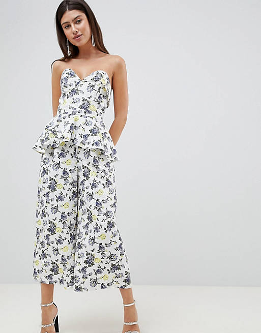 ASOS DESIGN structured bandeau jumpsuit with frill overlay in floral print
