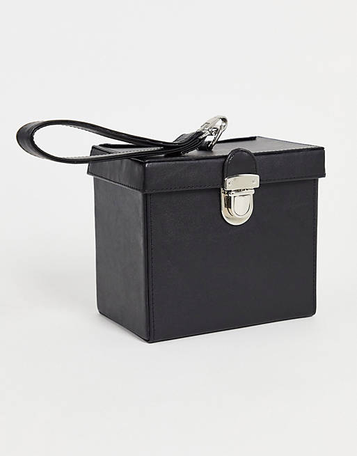  structured box bag in black faux leather with grab handle 