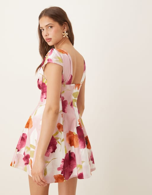 ASOS DESIGN structured bust seam detail cap sleeve mini dress in vibrant abstract print