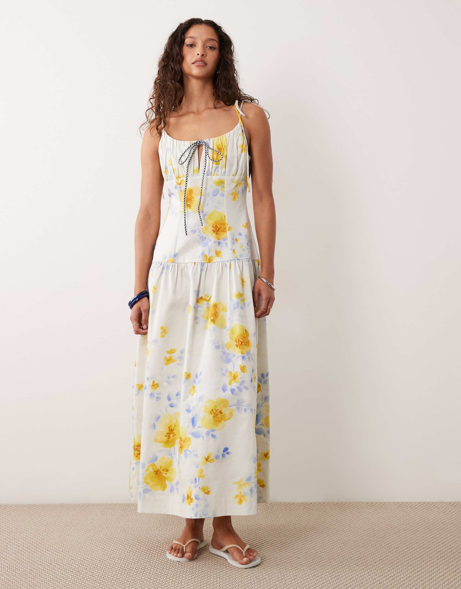 asos design structured cotton blend tie bust dropped waist midaxi sundress in painted blue & yellow floral with gingham tie straps
