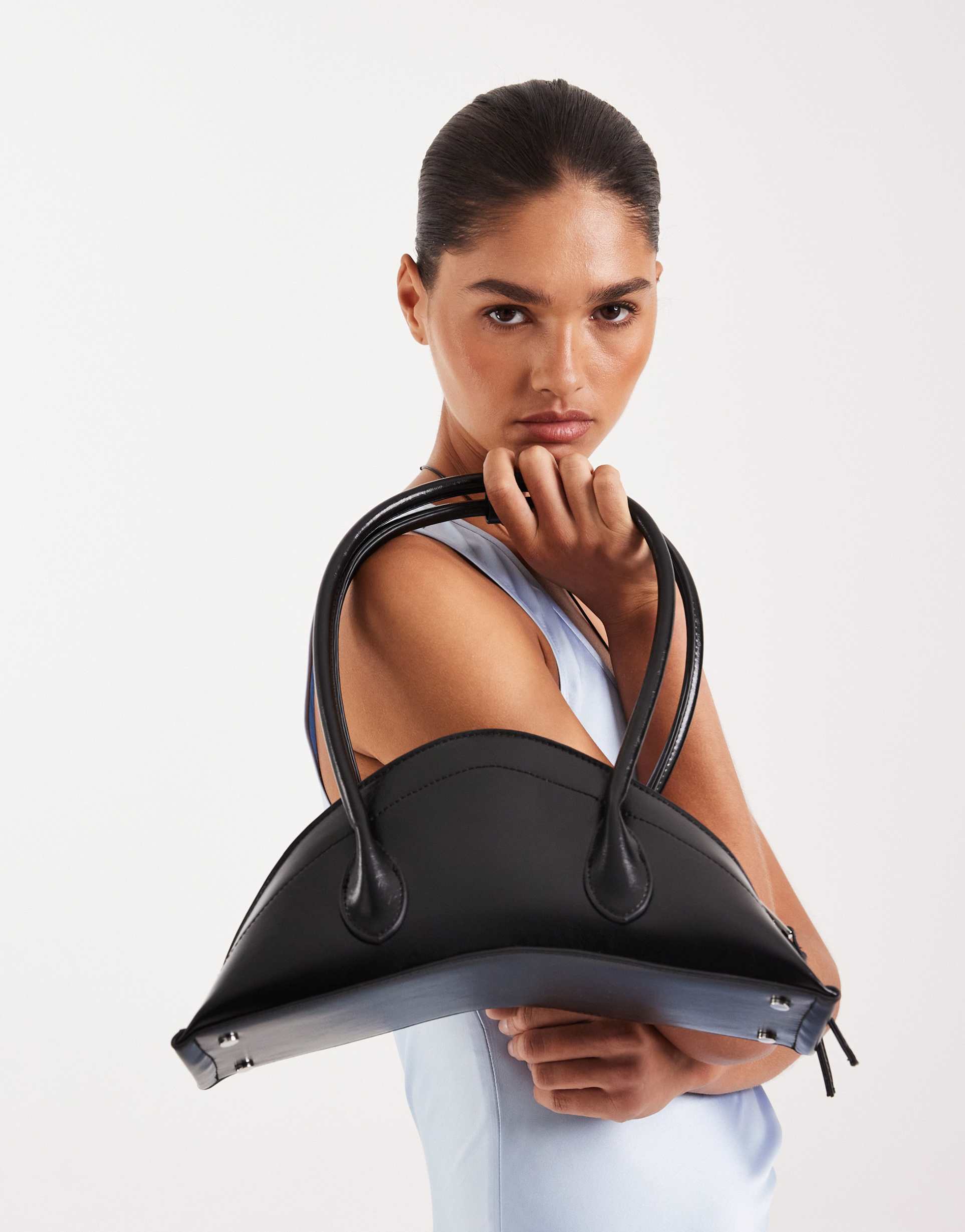 asos design structured croissant clutch purse in black