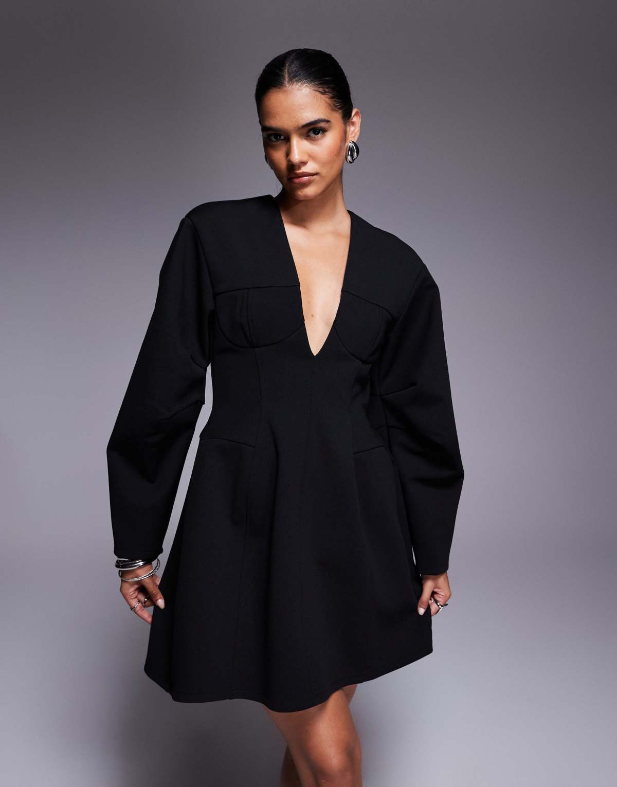 ASOS DESIGN structured dome sleeve plunge mini dress with cup seam detailing in black