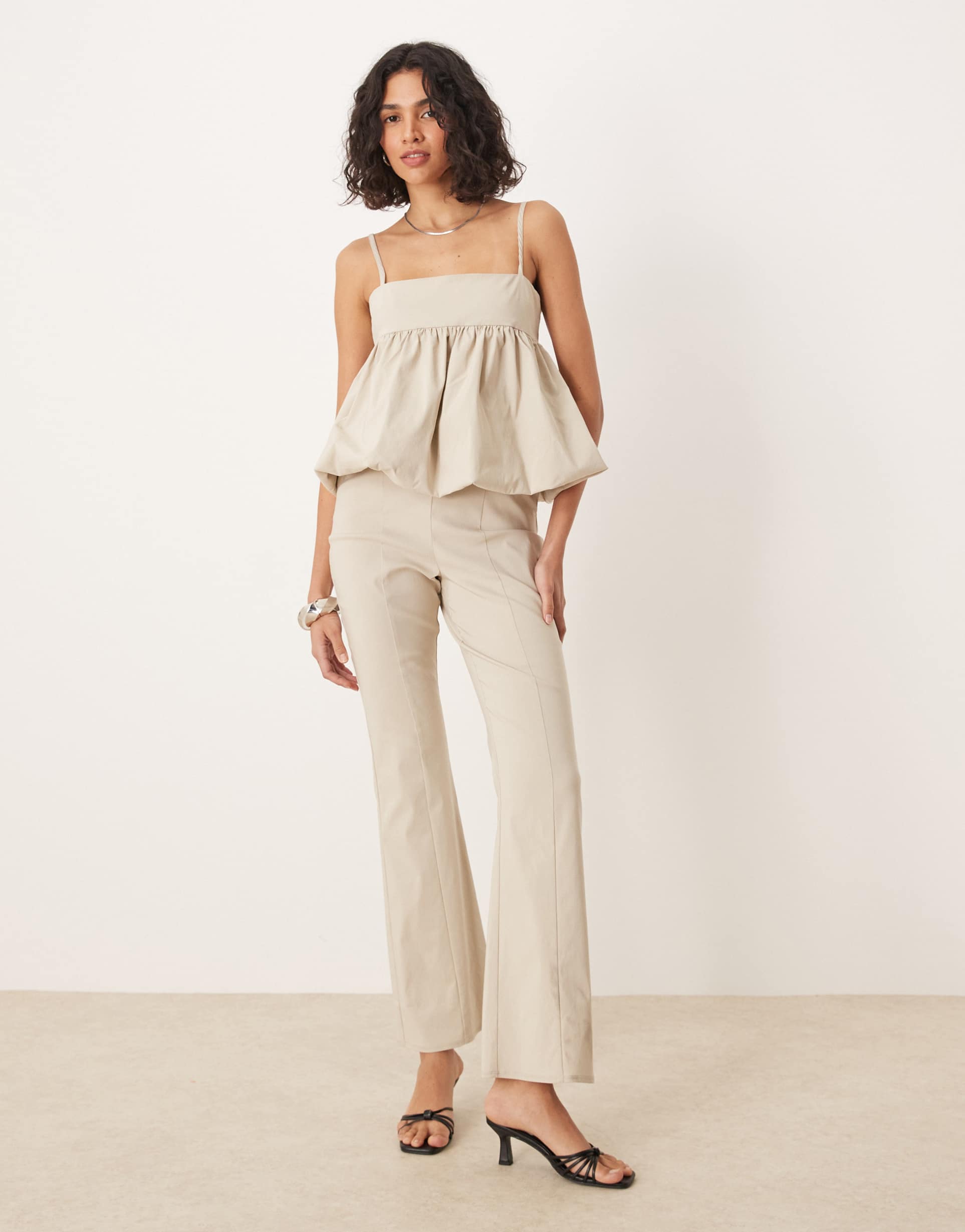 asos design structured peplum jumpsuit in ivory