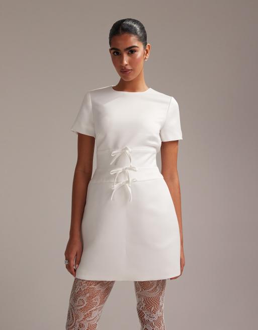 ASOS DESIGN structured satin mini dress with bow detail in ivory