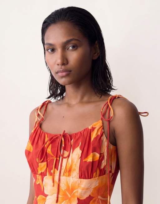 ASOS DESIGN struktureret bomulds-sundress med bindebuste og sænket talje i orange blomsterprint, 3 af 4