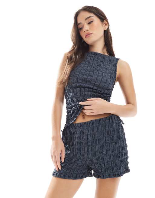 ASOS DESIGN – Strukturierte Hose in Blau mit Acid-Waschung und weitem Bein