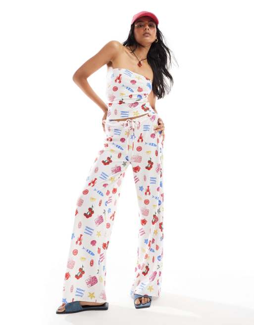 ASOS DESIGN – Strukturierte Hose mit sommerlichem Speise-Motiv und weitem Bein, Kombiteil