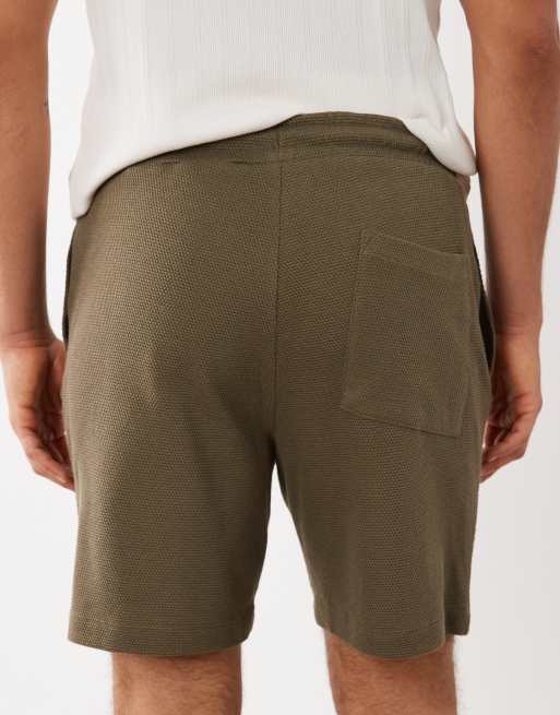 ASOS DESIGN – Strukturierte Slim-Fit-Shorts aus Jersey in Steinbeige, 4 von 5