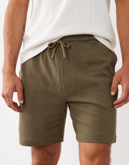 ASOS DESIGN – Strukturierte Slim-Fit-Shorts aus Jersey in Steinbeige, 5 von 5