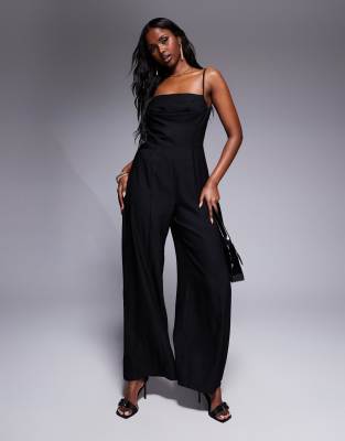 ASOS DESIGN - Strukturierter Jumpsuit in Schwarz mit Korsettdetail