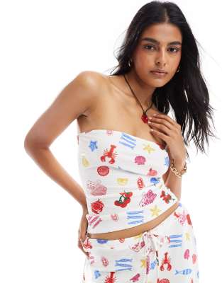 ASOS DESIGN - Strukturiertes, schulterfreies Oberteil mit sommerlichem Speise-Motiv, Kombiteil-Bunt