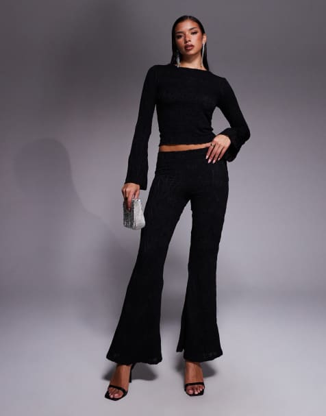 ASOS DESIGN – Strukturiertes Set in Schwarz mit Oberteil mit ausgestellten, langen Ärmeln und Hose - view 1
