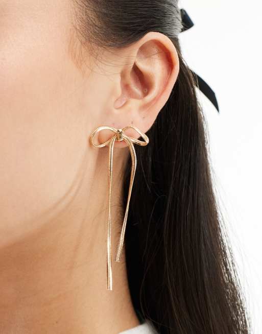 ASOS DESIGN stud earrings with bow chain design in gold tone, 4 of 4