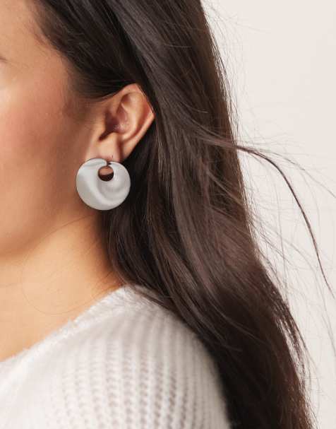 ASOS DESIGN stud earrings with circle detail in brushed silver tone - view 1