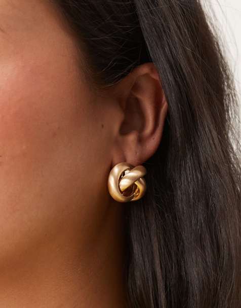 ASOS DESIGN stud earrings with circular knot detail in brushed gold - view 1