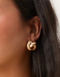 [ASOS DESIGN] ASOS DESIGN stud earrings with circular knot detail in brushed gold No Size Brushed Gold